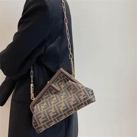 fendi clutch with chain|Fendi clutch handbags.